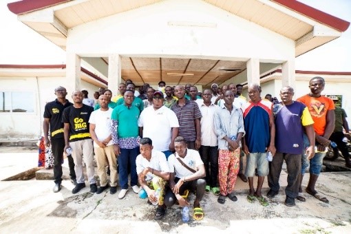 A group of people posing for a photoDescxxxription automatically generated